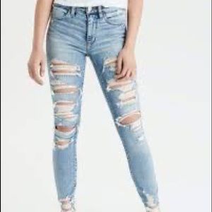 Ripped light wash skinny jeans